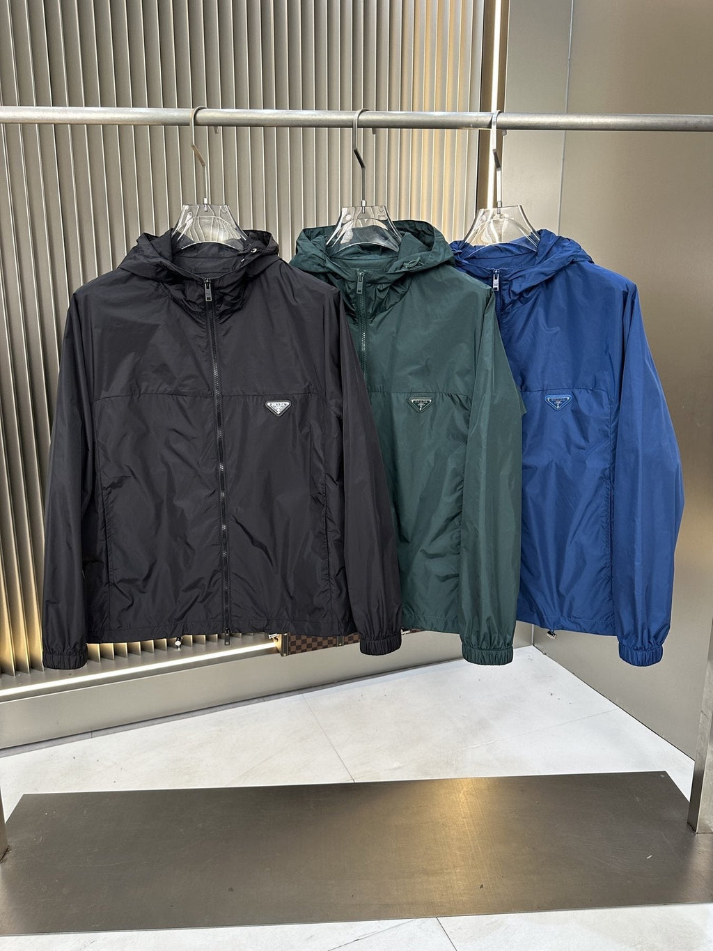 Prada Hooded Zip-Front Windbreaker — comparison