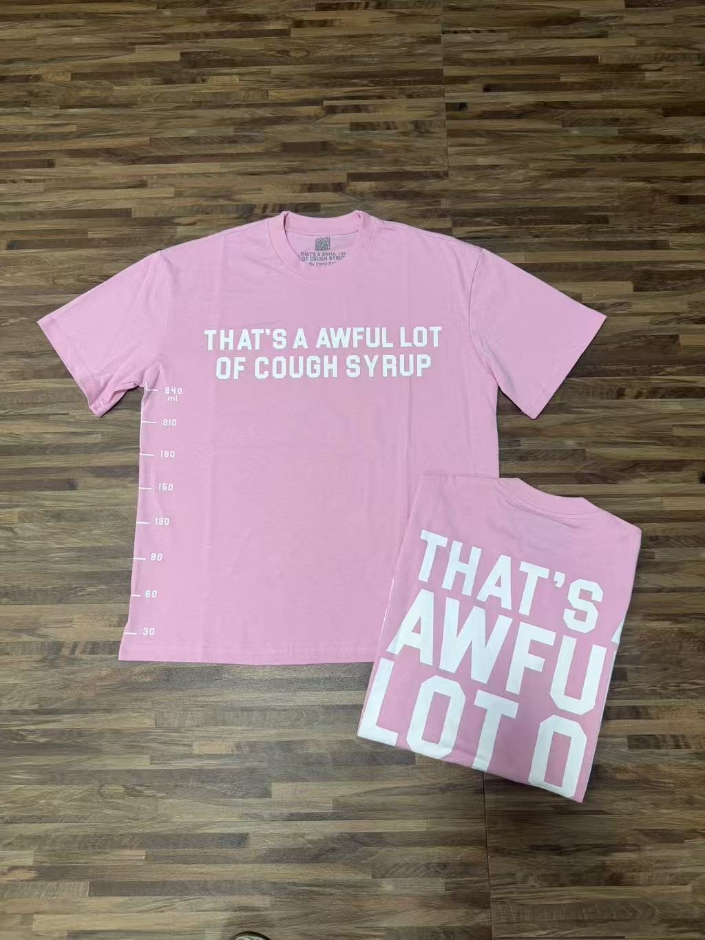 THAT'S A AWFUL LOT OF COUGH SYRUP White/Gray Wordmark T-Shirt — context