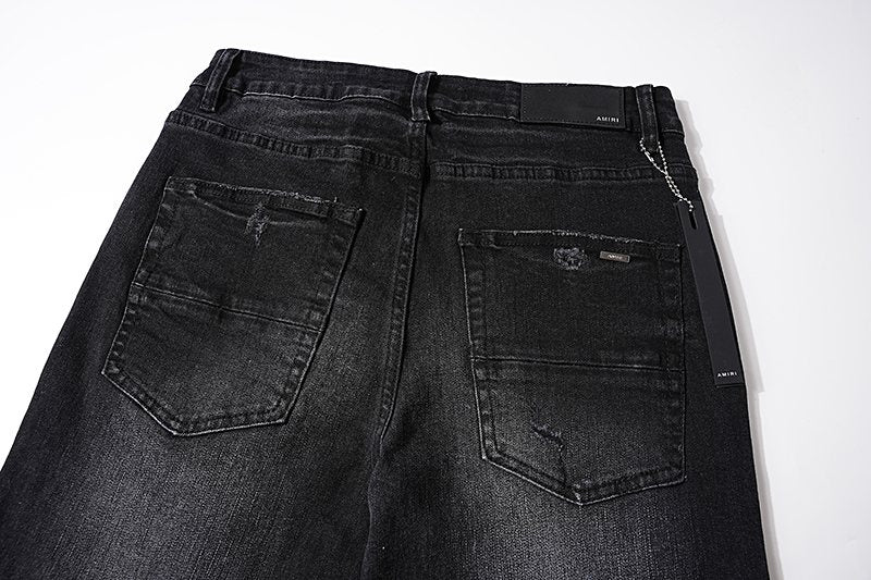 AMIRI Black Washed Distressed Jeans — detail