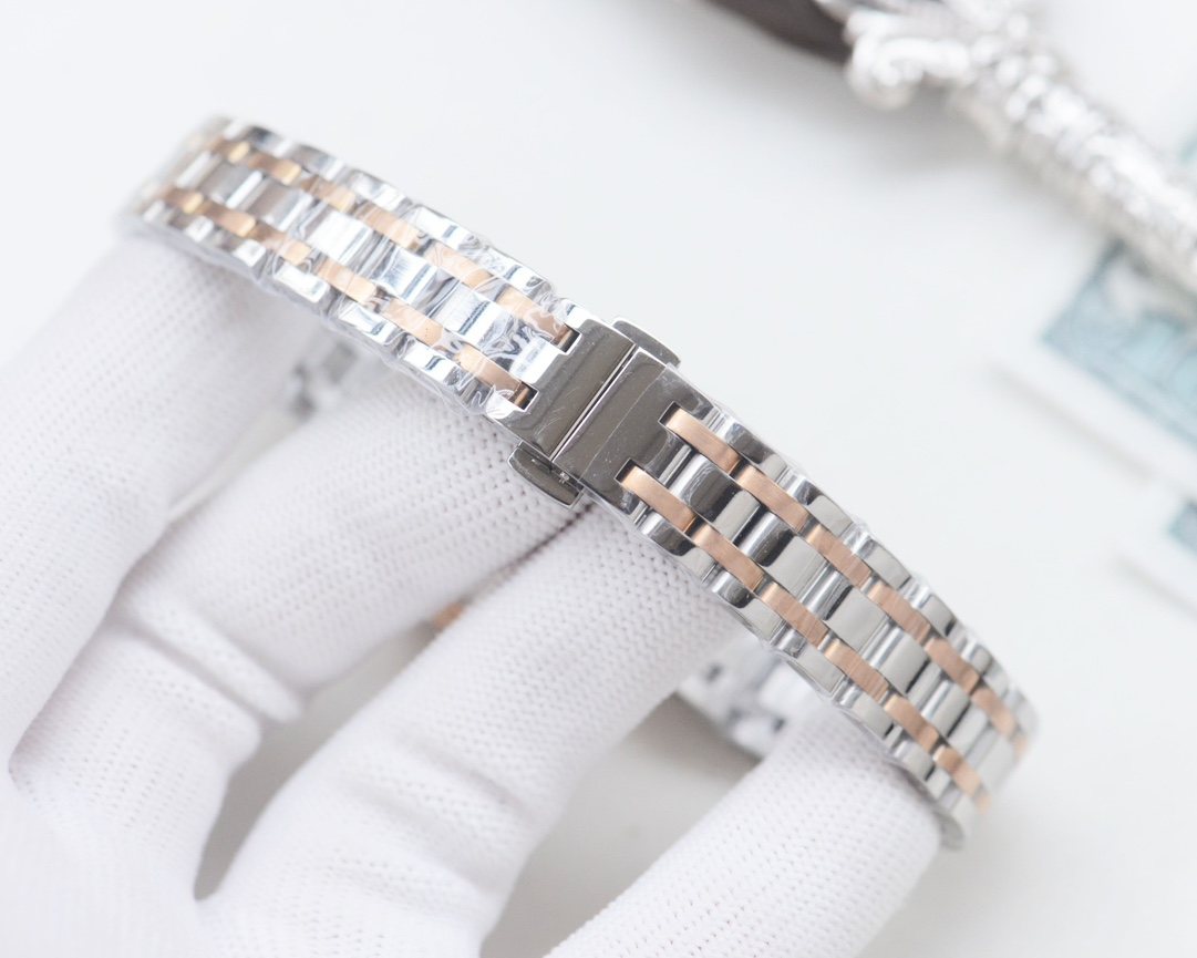 Tissot Rose Gold Silver Watch — detail