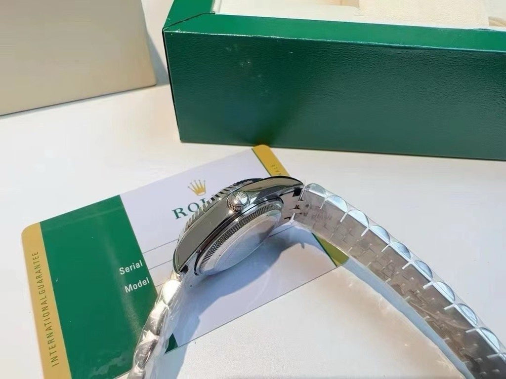 Rolex Pink Dial Silver Bracelet Watch — detail
