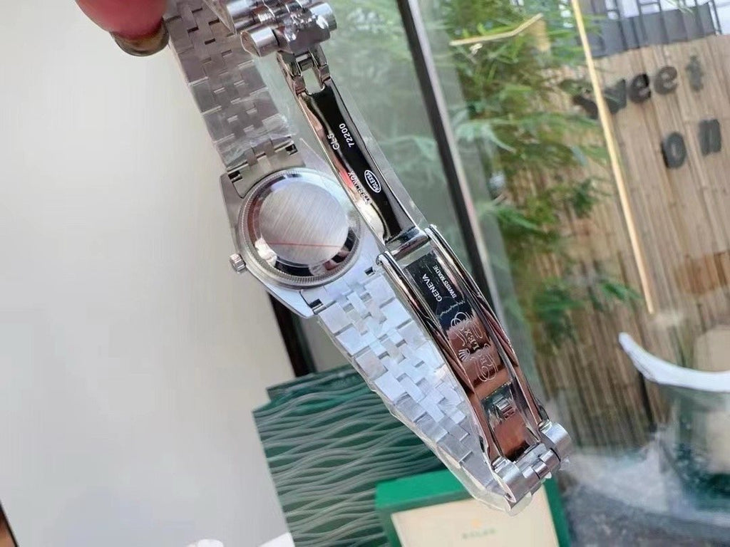 Rolex Pink Dial Silver Bracelet Watch — side