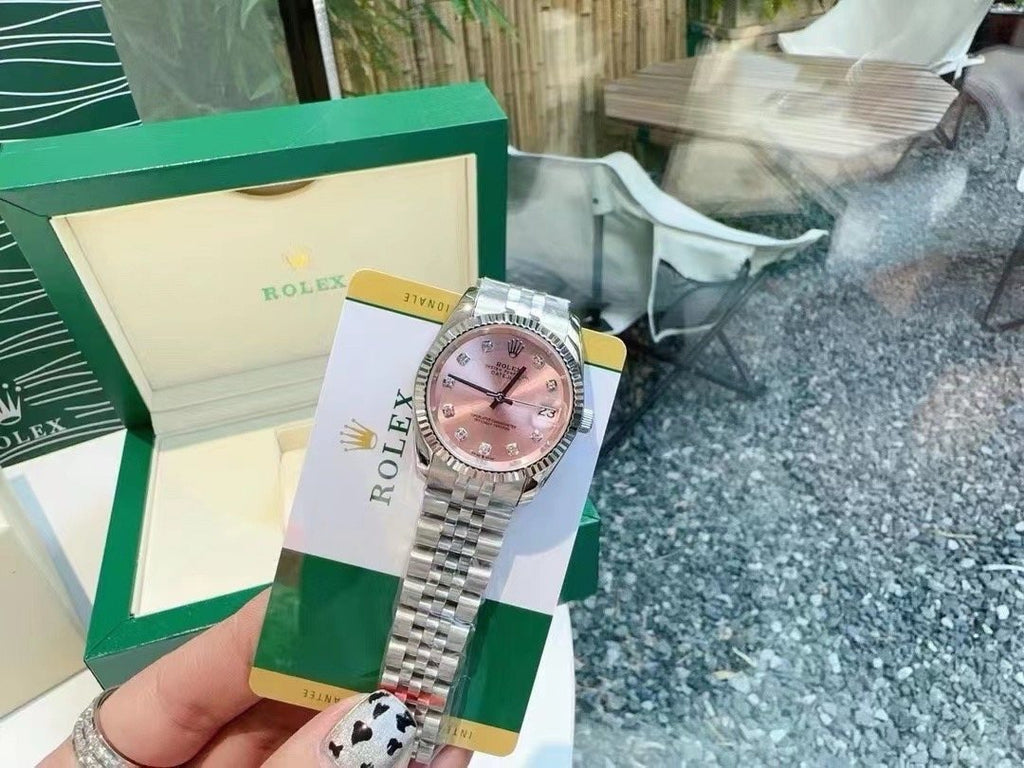 Rolex Pink Dial Silver Bracelet Watch — model