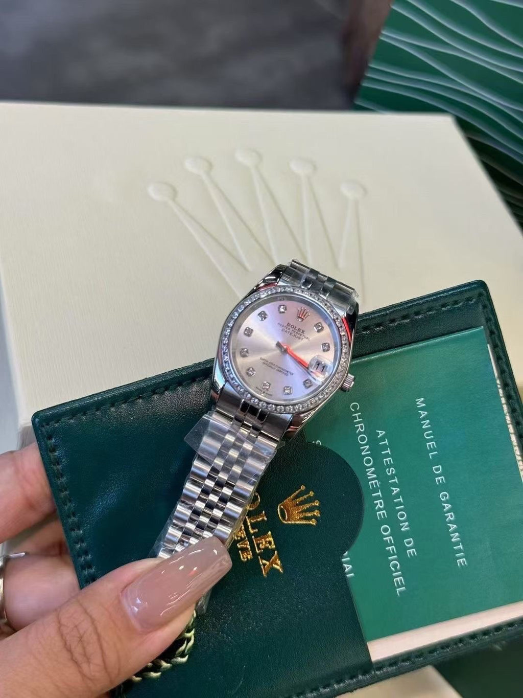 Rolex Iridescent Dial Metal Bracelet Watch — front