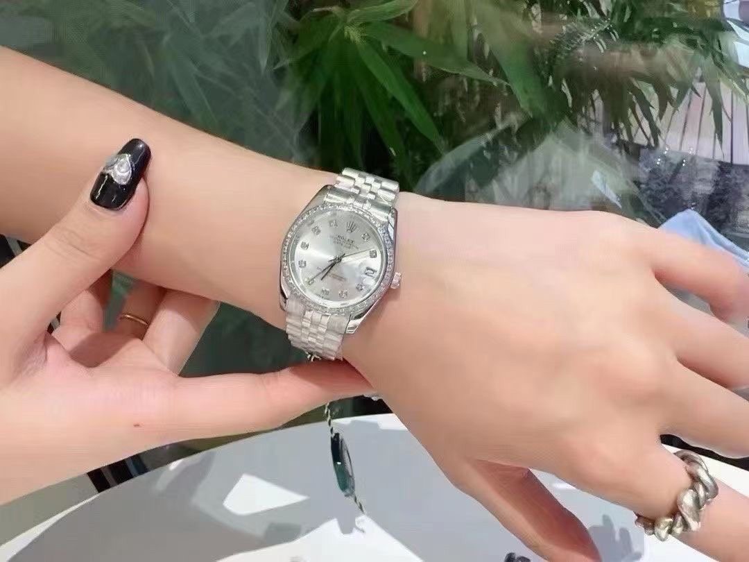 Rolex Iridescent Dial Metal Bracelet Watch — model