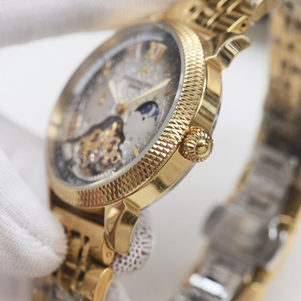 Patek Philippe Gold Green Dial Bracelet Watch — side