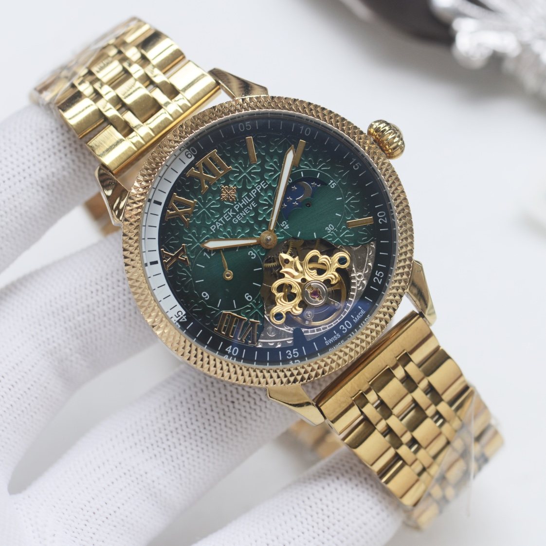 Patek Philippe Gold Green Dial Bracelet Watch — hero