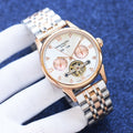 Patek Philippe Rose Gold Two Tone White Dial Bracelet Watch — hero