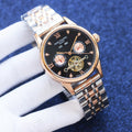 Patek Philippe Rose Gold Two Tone Black Dial Bracelet Watch — hero