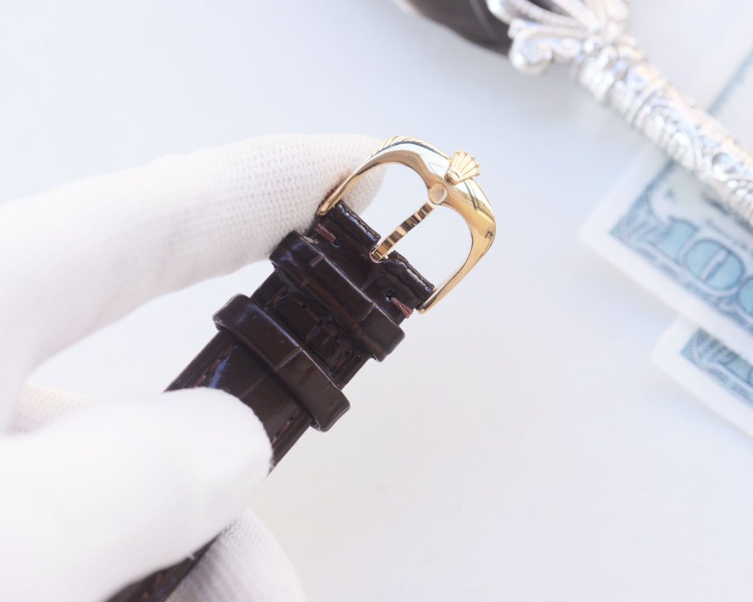 Rolex Gold Brown Strap Watch — detail