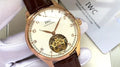 IWC White Dial Brown Strap Watch — hero