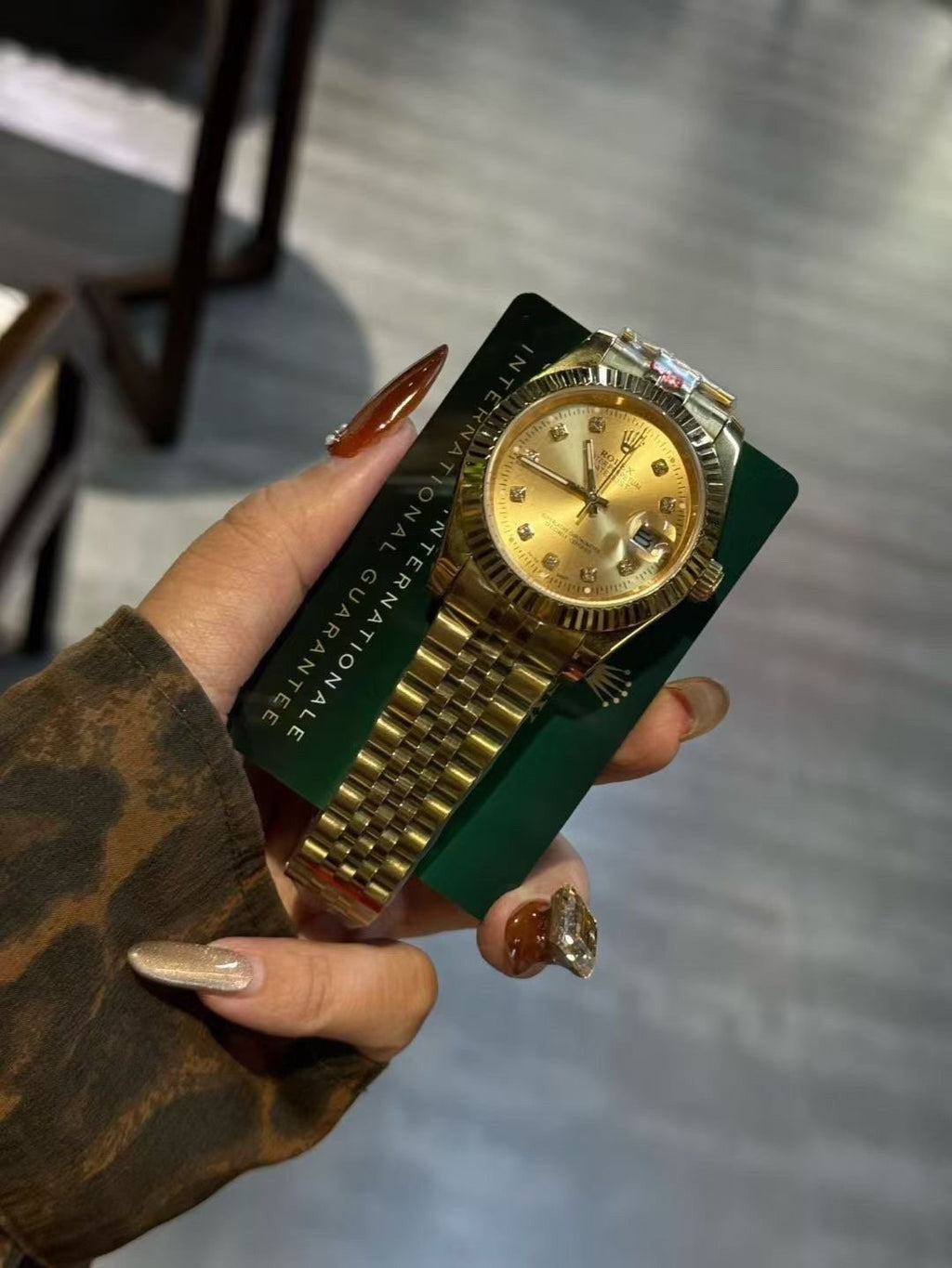 Rolex Gold-Tone Champagne Dial Watch — front