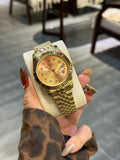 Rolex Gold-Tone Champagne Dial Watch — hero