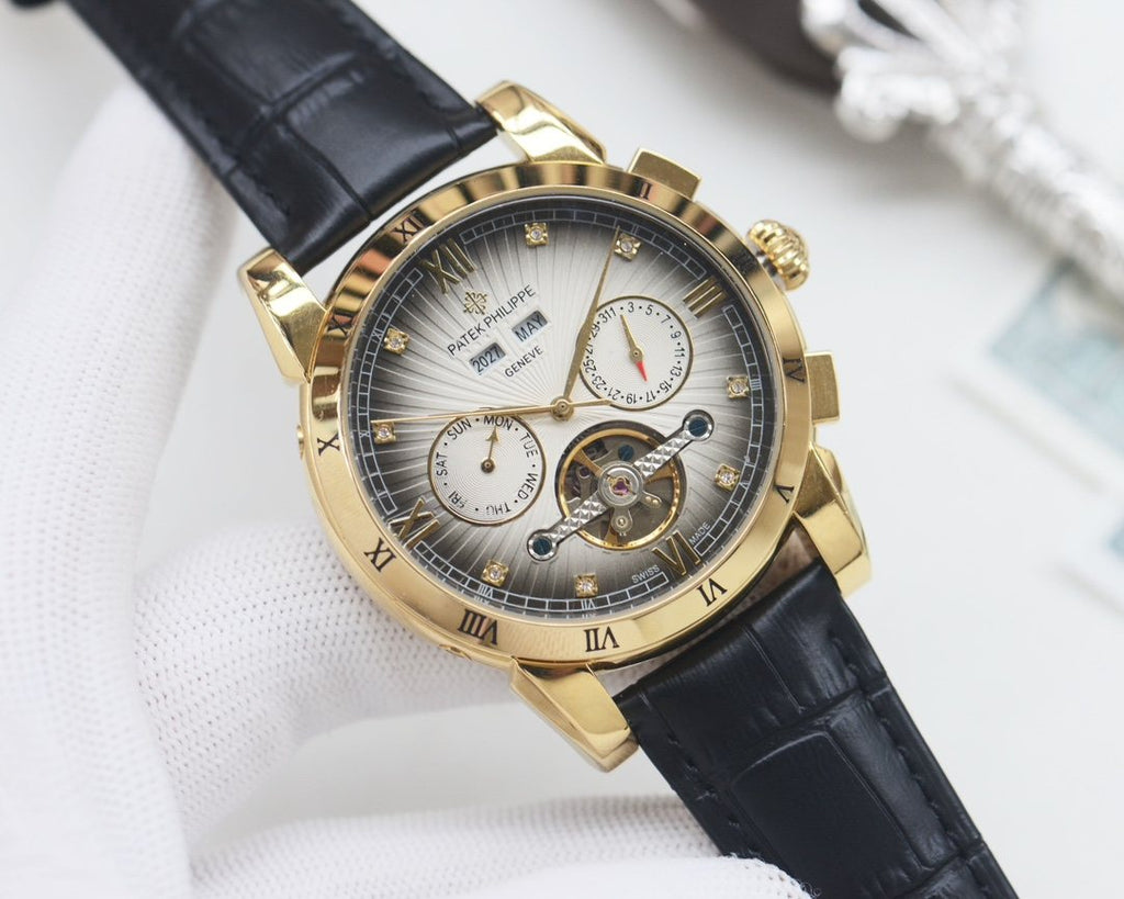 Patek Philippe Gold Black Silver Dial Strap Watch — hero