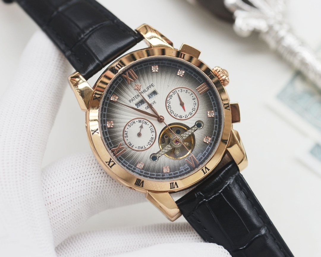 Patek Philippe Gold Black Silver Dial Strap Watch — front