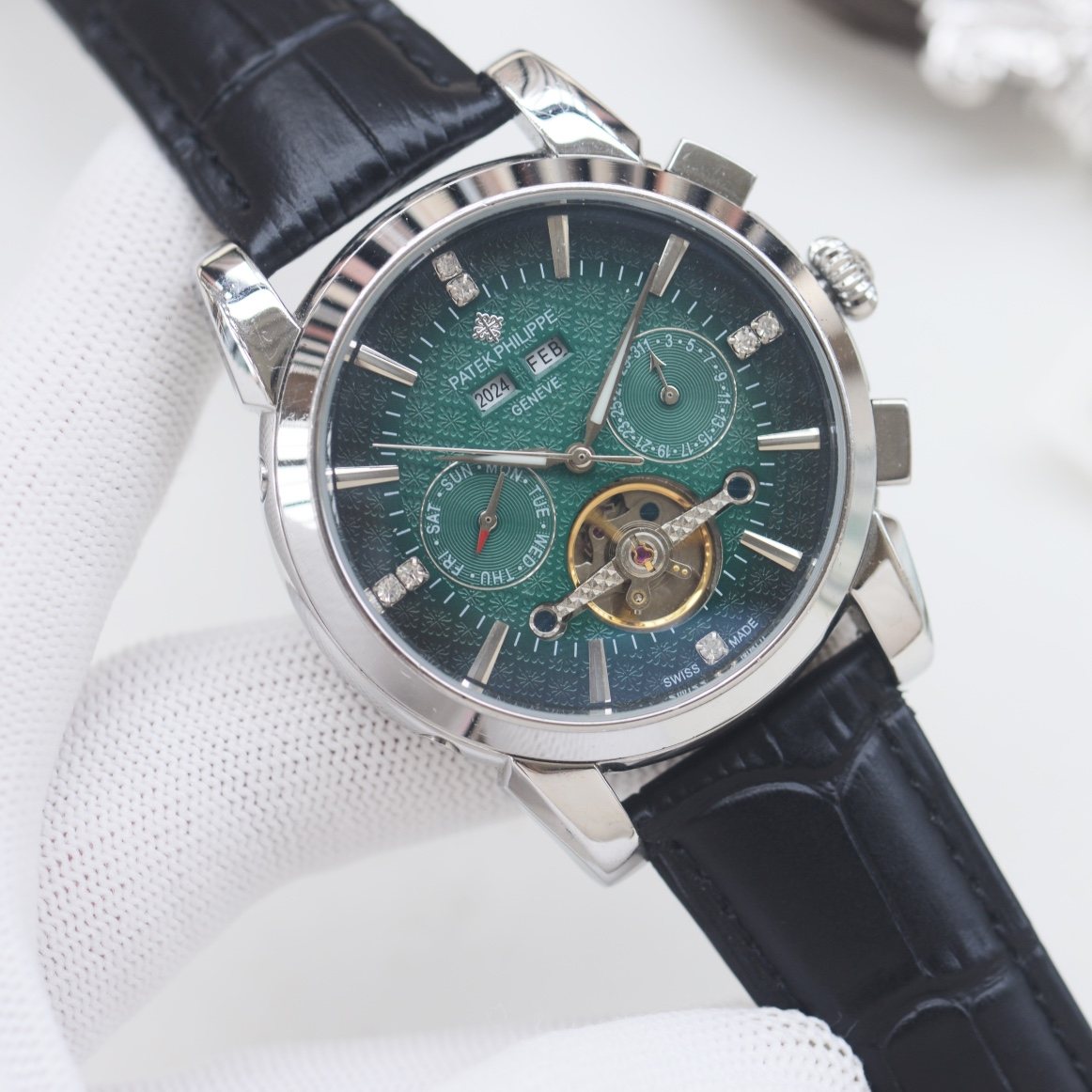 Patek Philippe Silver Black Green Dial Strap Watch — hero