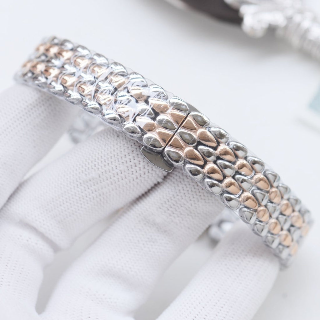OMEGA Silver Rose Gold Watch — detail