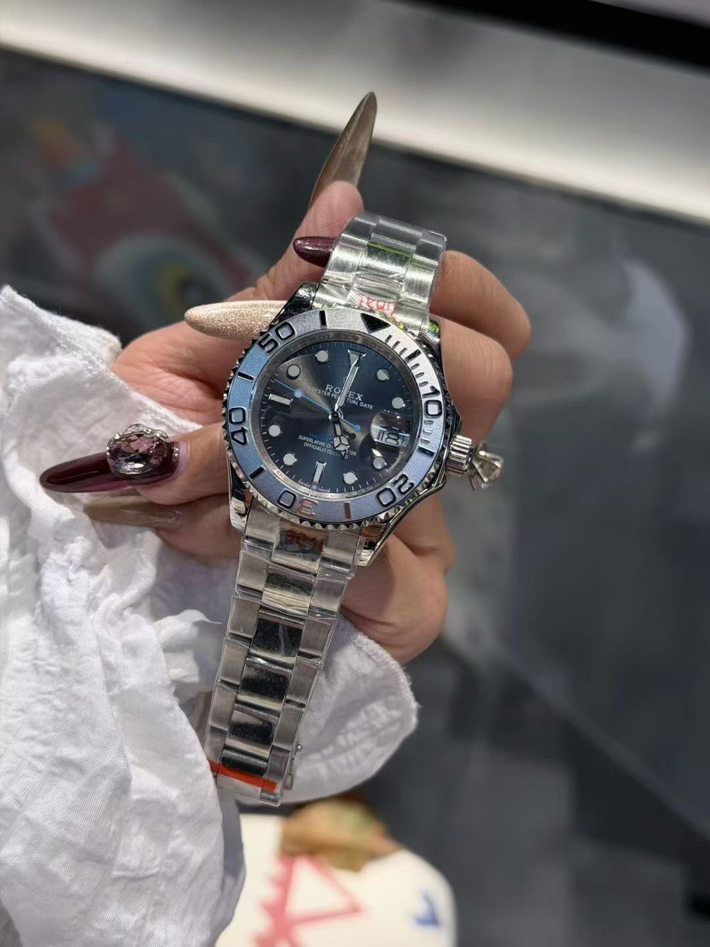 Rolex Blue Dial Silver Bracelet Watch — front