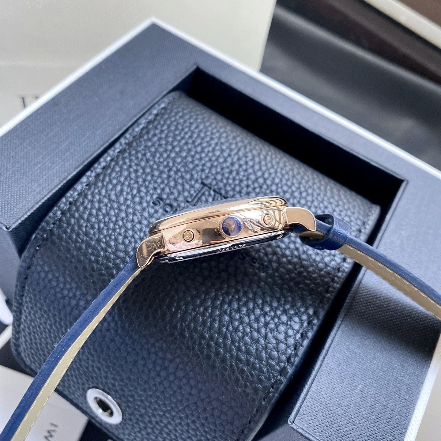 IWC Rose Gold Blue Dial Strap Watch — side