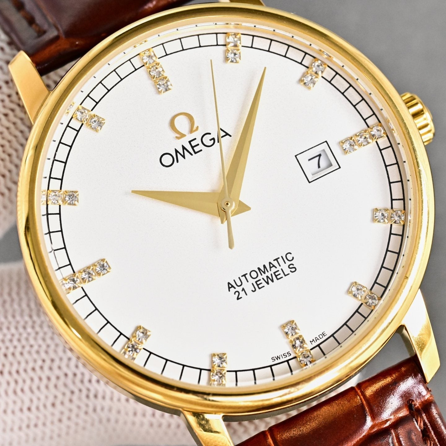 Omega Gold Brown White Dial Strap Watch — detail