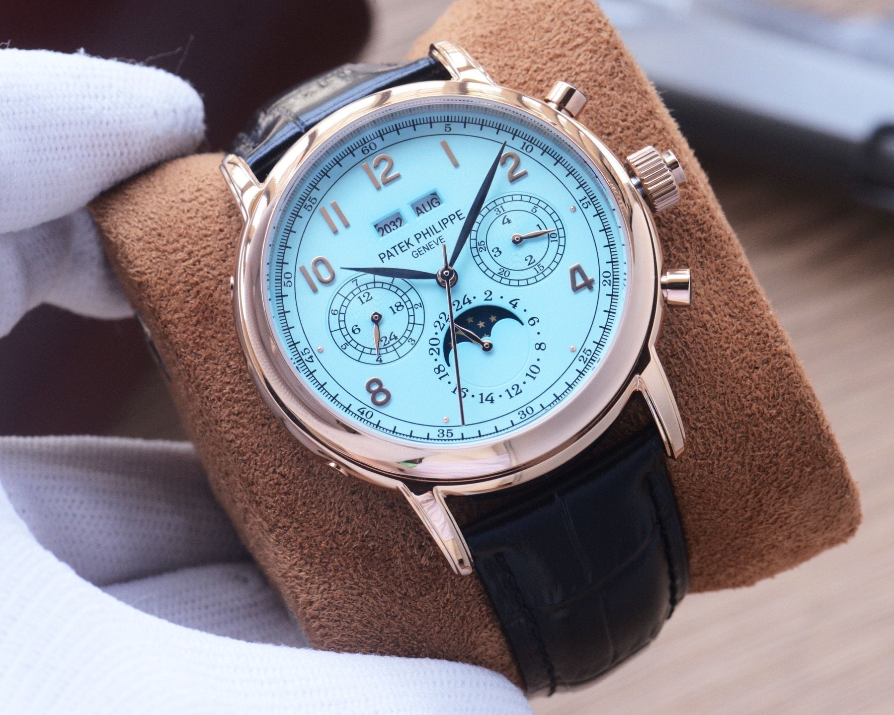 Patek Philippe Black Rose Gold Blue Dial Strap Watch — hero