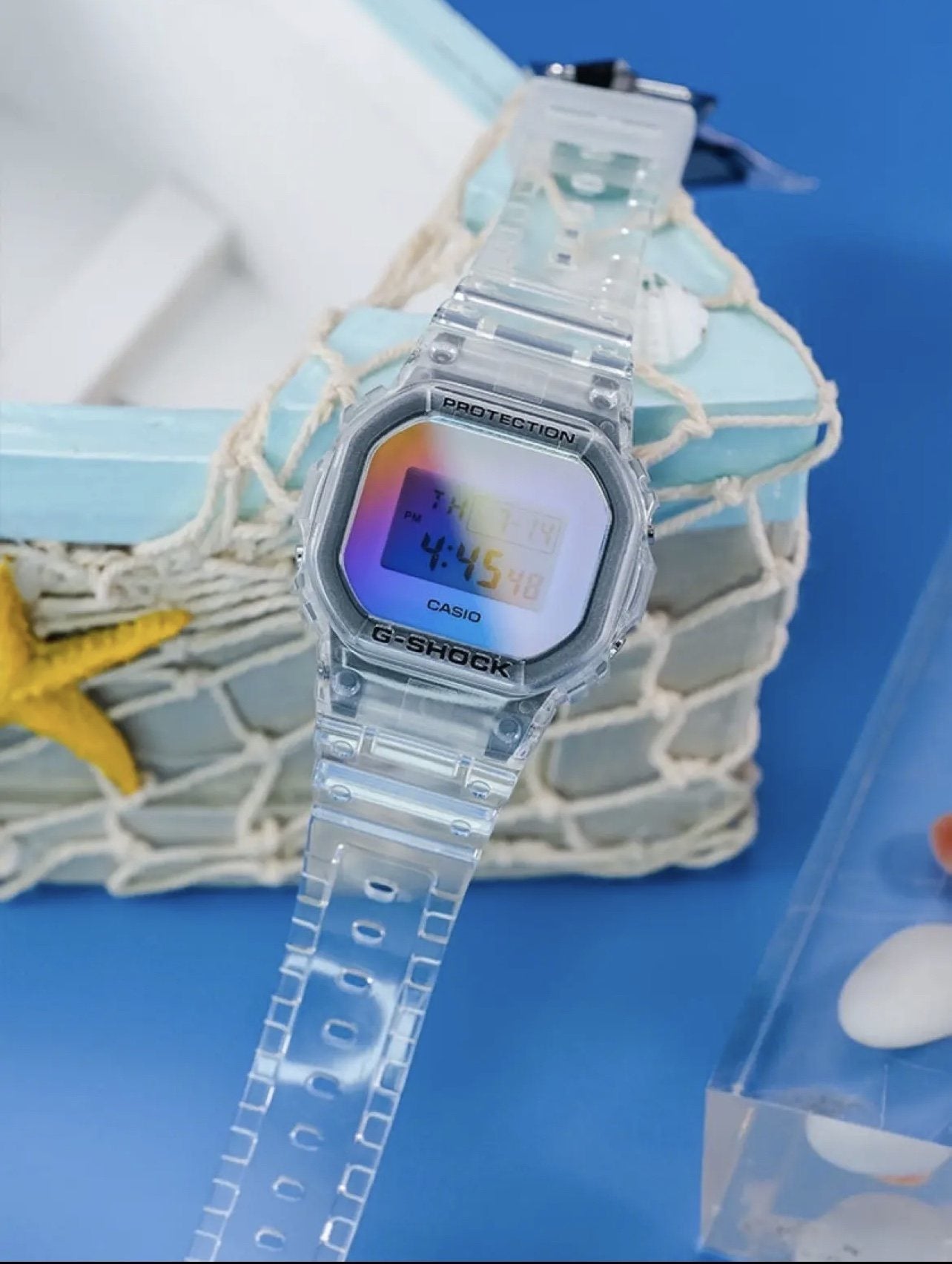 CASIO Clear Iridescent Digital Watch — front