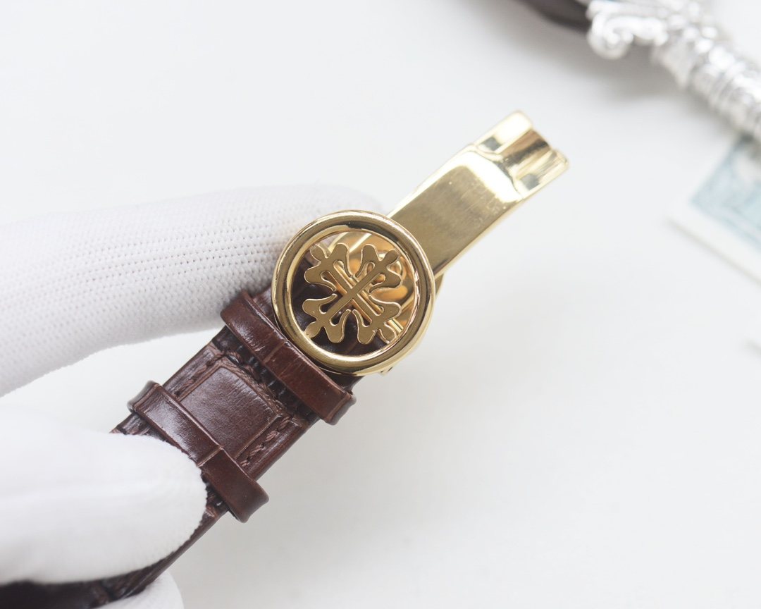 Patek Philippe Gold Silver Blue Dial Strap Watch — detail