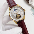 WINNER Gold-Tone Open-Heart Watch — hero