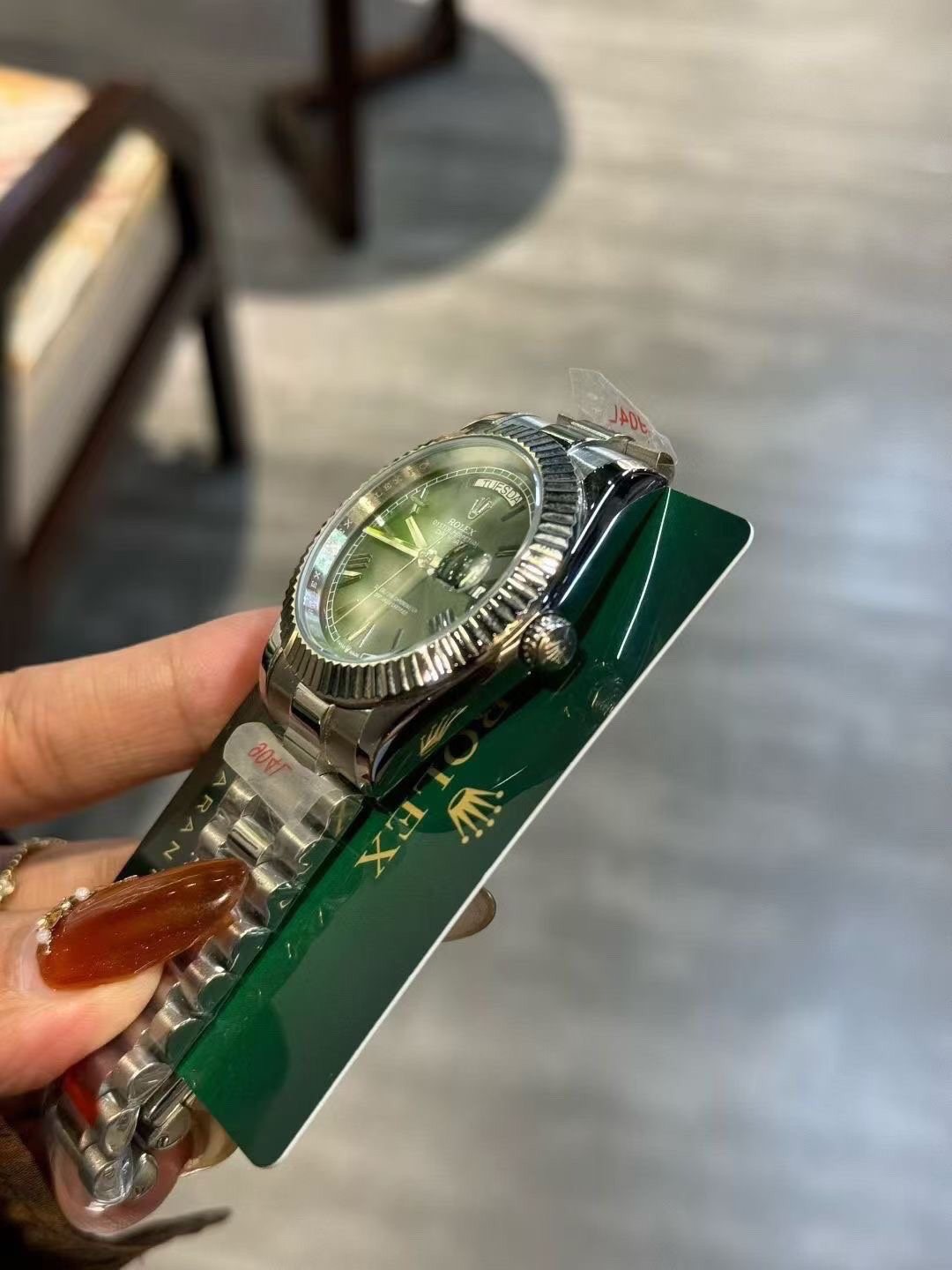 Rolex Green Dial Fluted Bezel Watch — side
