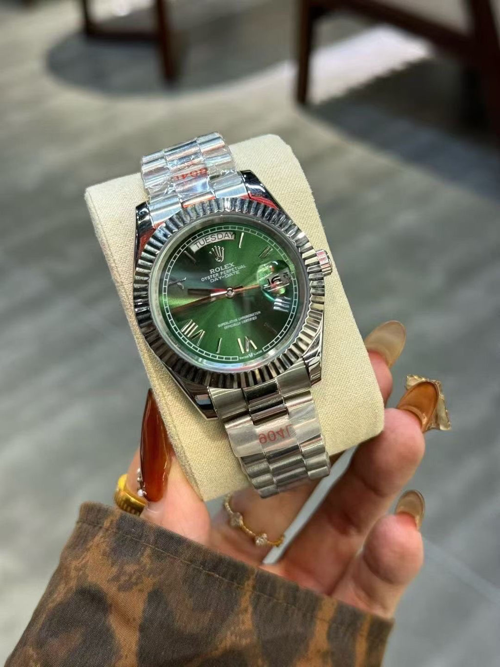 Rolex Green Dial Fluted Bezel Watch — hero
