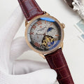 Patek Philippe Gold-Tone Burgundy Strap Watch — hero