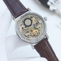 Patek Philippe Silver Brown Strap Watch — hero