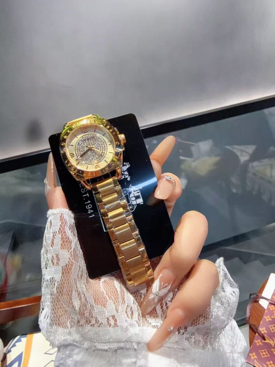 Coach Gold-Tone Crystal Bezel Watch — front
