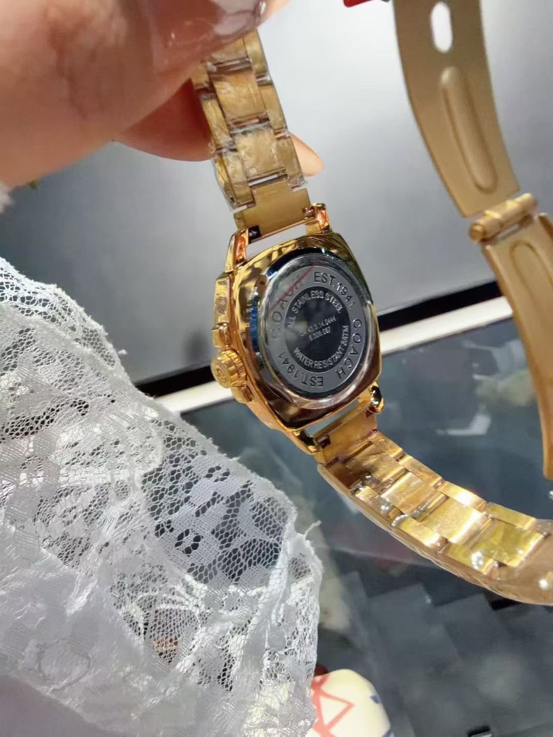 Coach Gold-Tone Crystal Bezel Watch — back