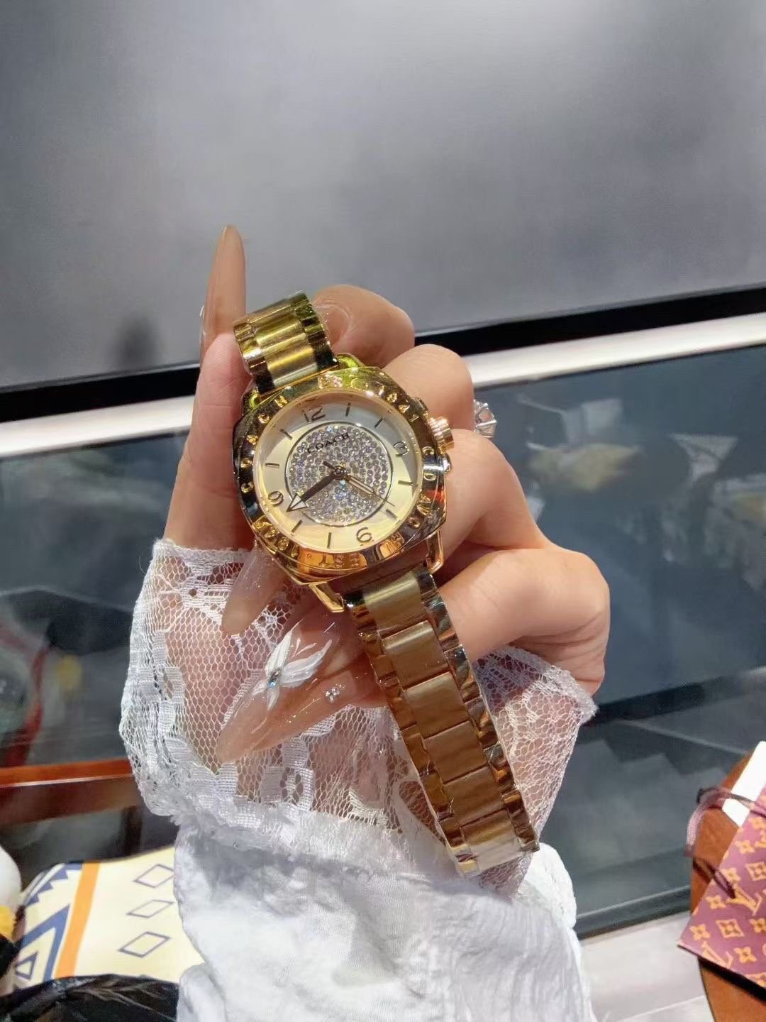 Coach Gold-Tone Crystal Bezel Watch — front
