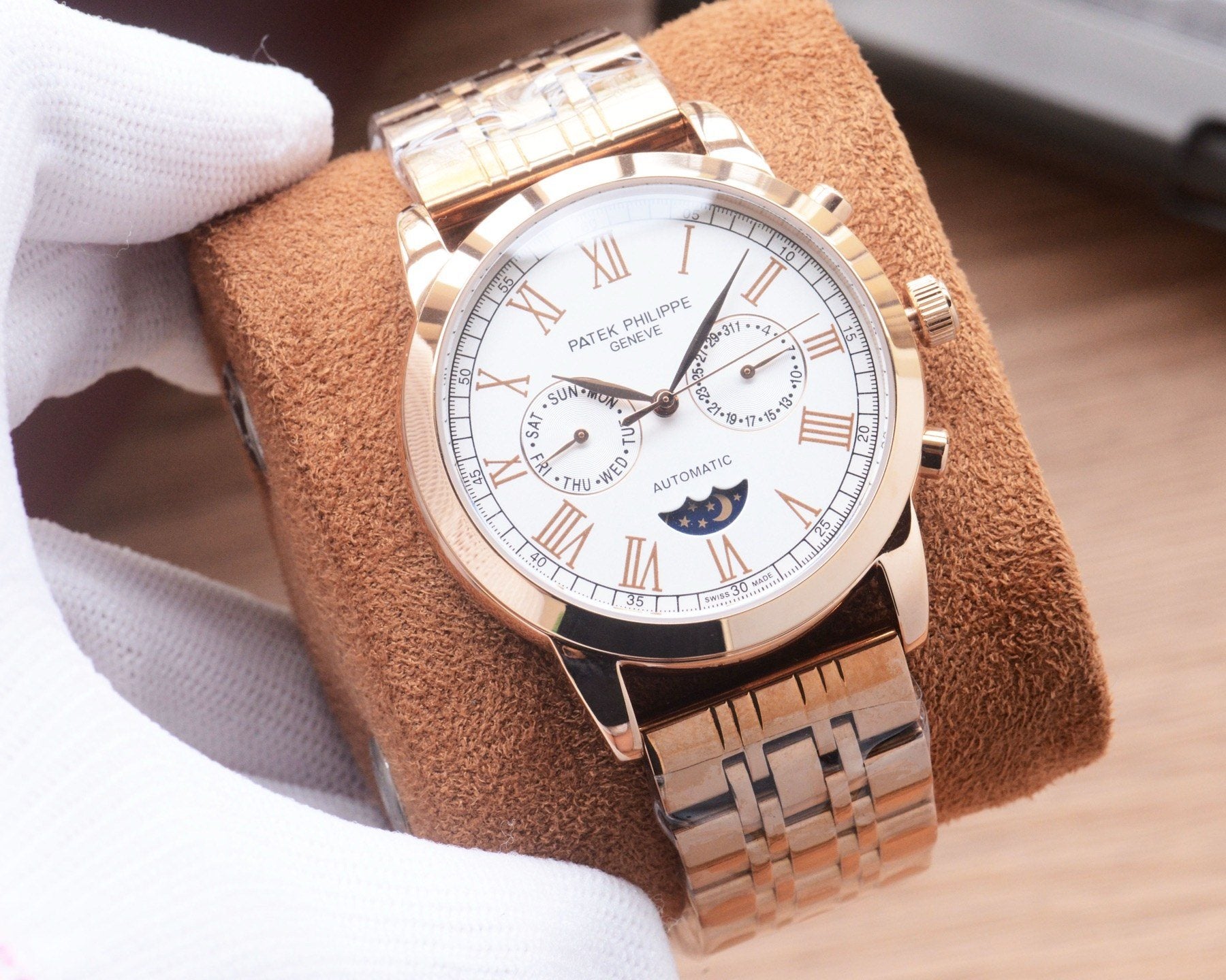 Patek Philippe Rose Gold Silver White Dial Bracelet Watch — hero