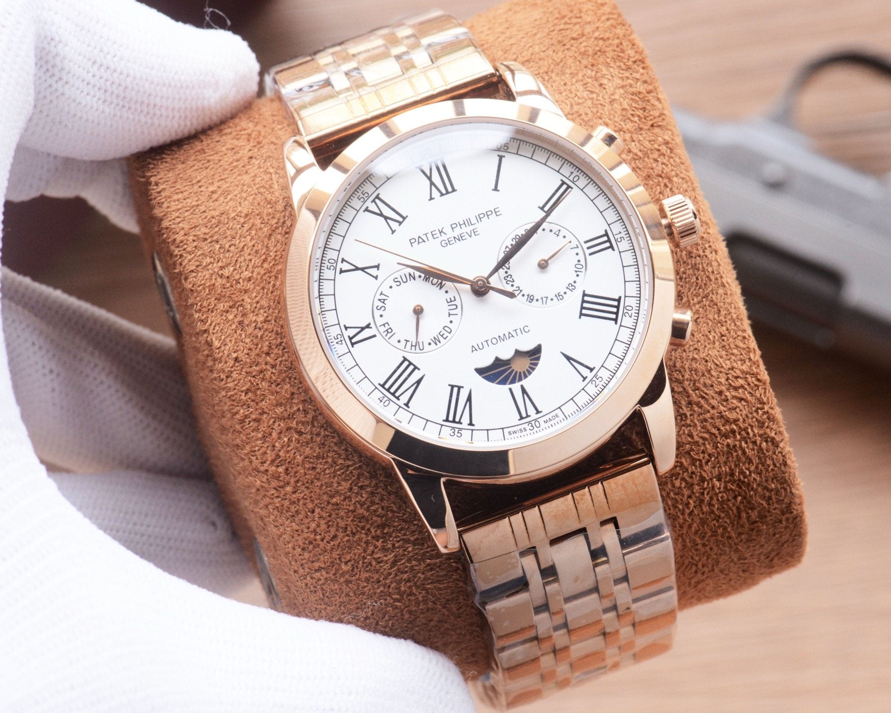 Patek Philippe Rose Gold Silver White Dial Bracelet Watch — front