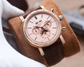 Patek Philippe Rose Gold Brown Pink Dial Strap Watch — hero