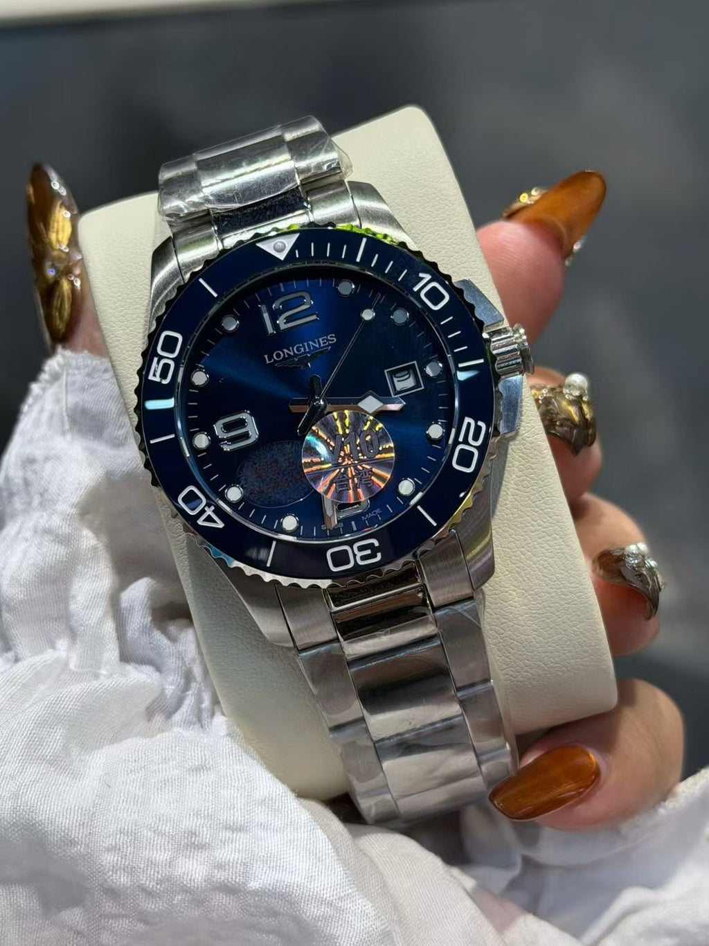 Longines Blue Bezel Link Bracelet Watch — front