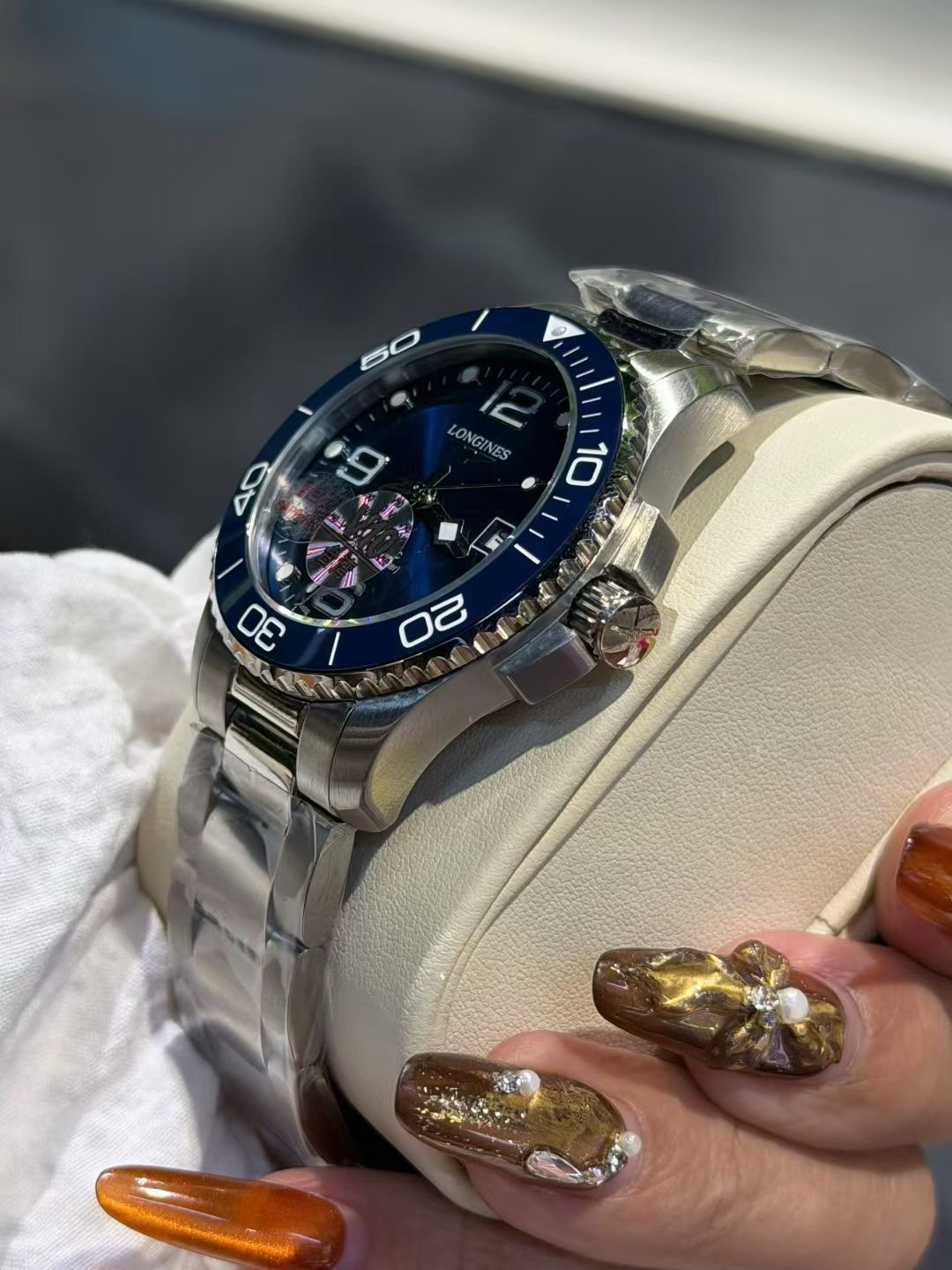 Longines Blue Bezel Link Bracelet Watch — hero