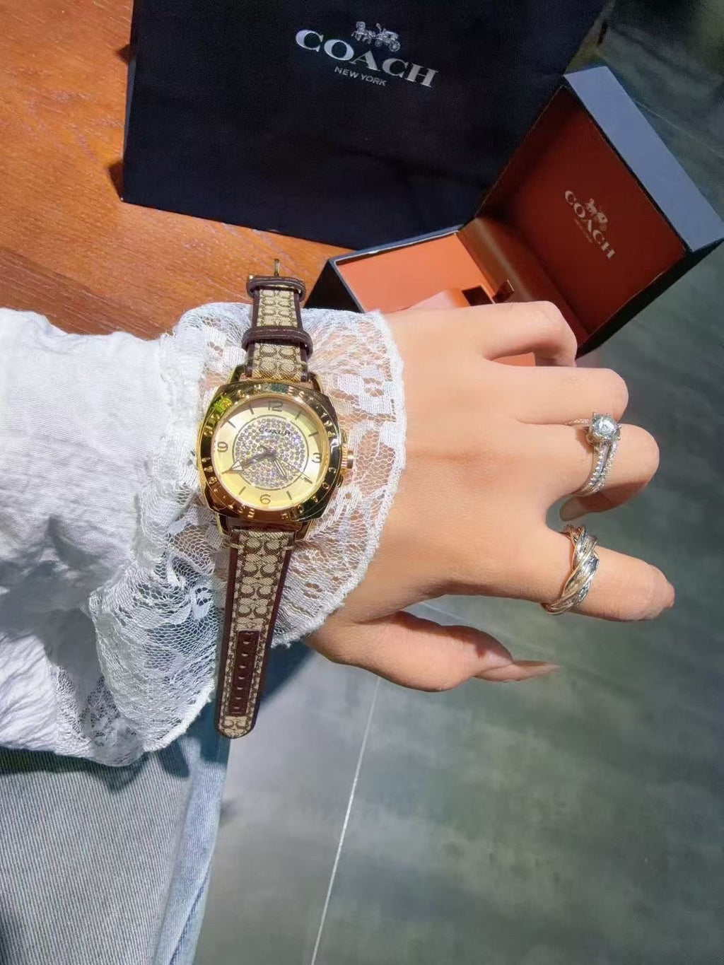Coach Gold-Tone Patterned Strap Watch — model