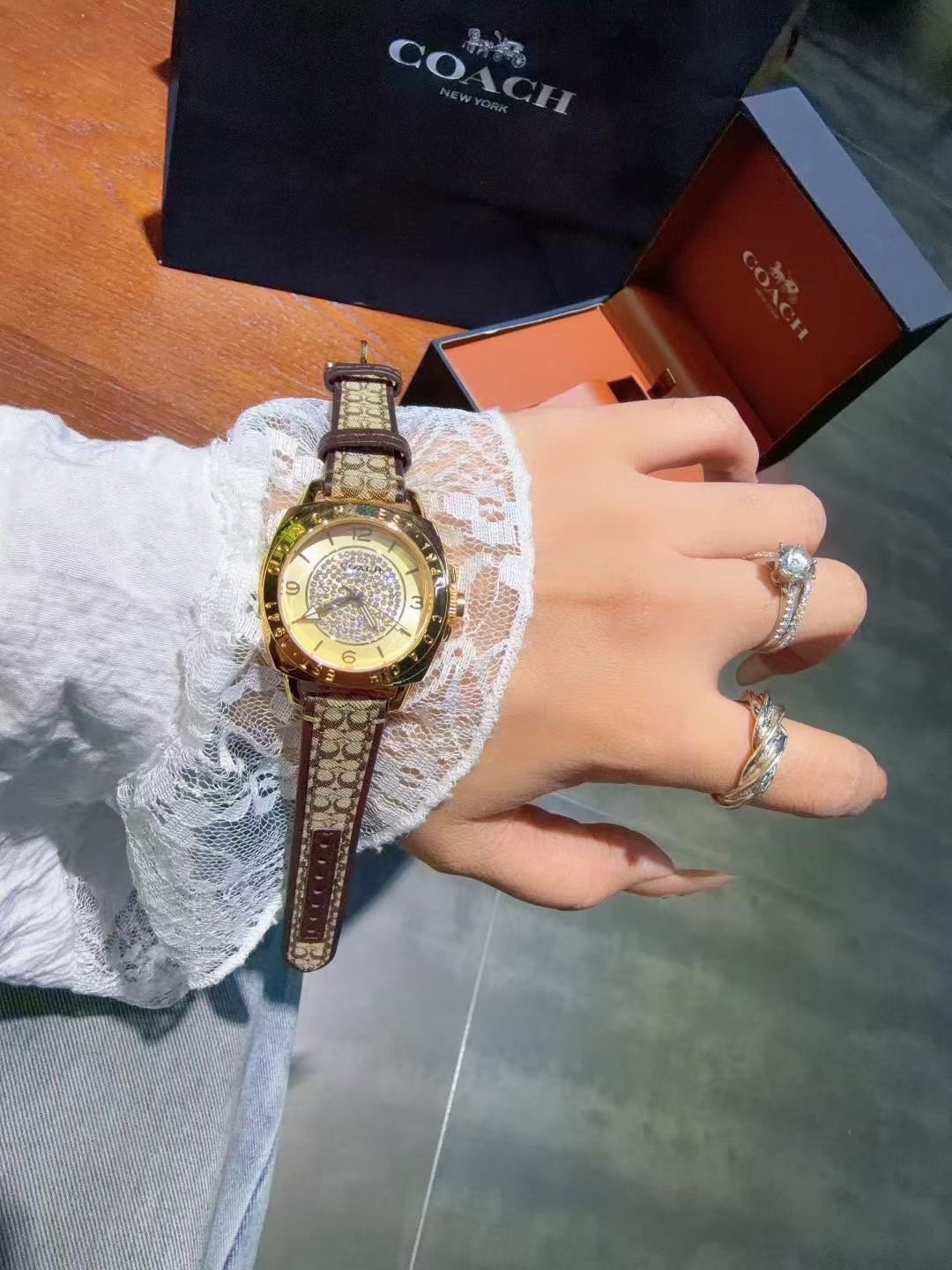 Coach Gold-Tone Patterned Strap Watch — model