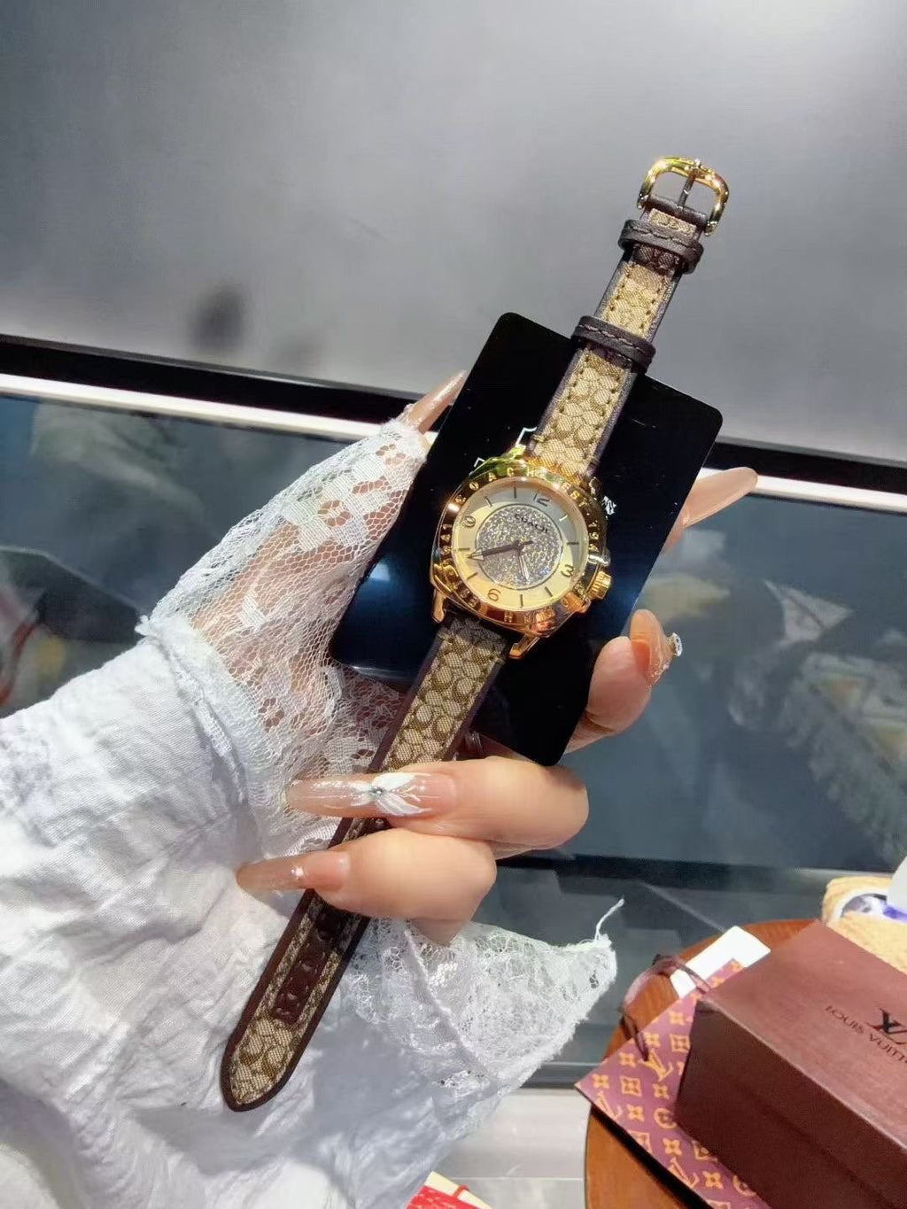 Coach Gold-Tone Patterned Strap Watch — front