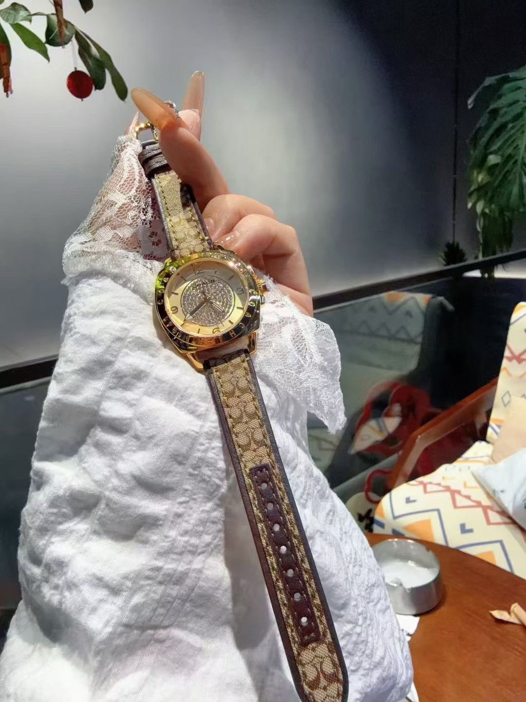 Coach Gold-Tone Patterned Strap Watch — model