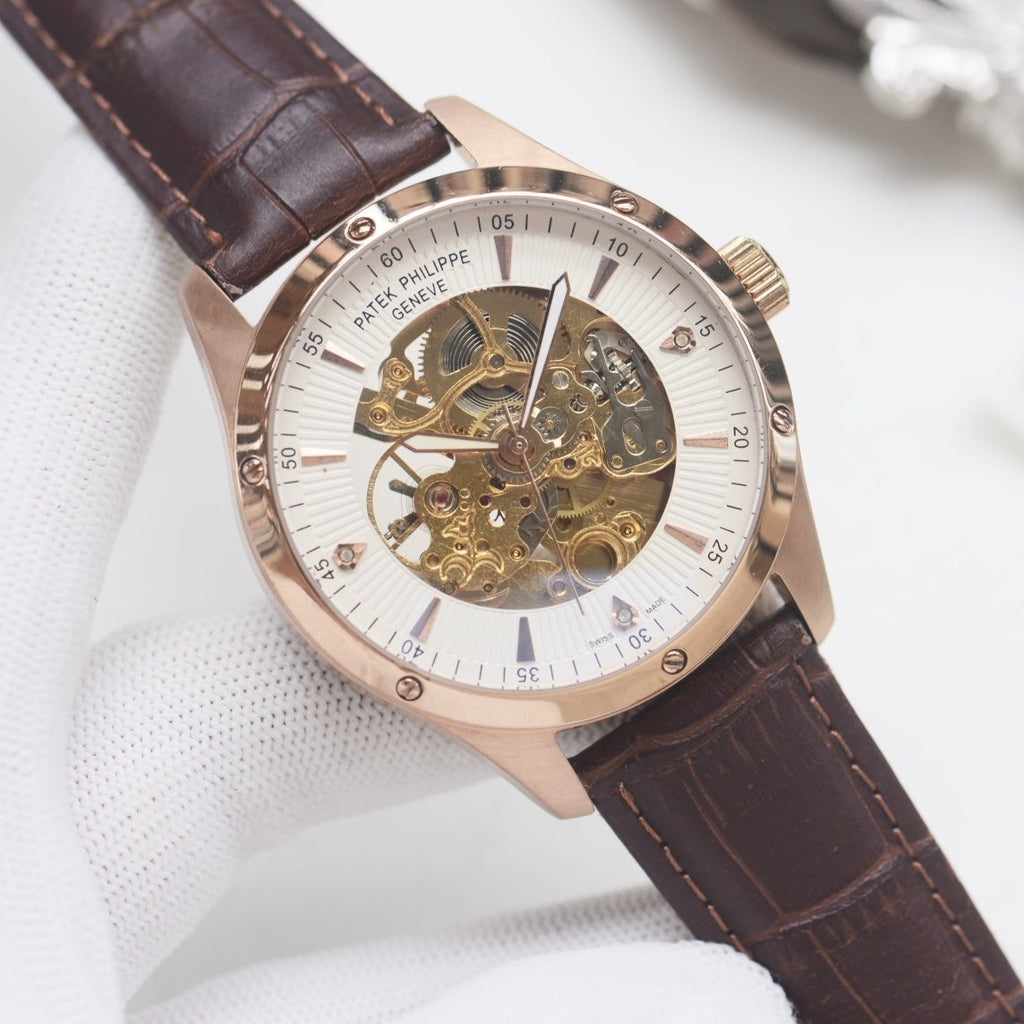 Patek Philippe Rose Gold White Strap Watch — hero