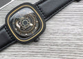 SEVENFRIDAY Black Gold Layered Dial Watch — hero