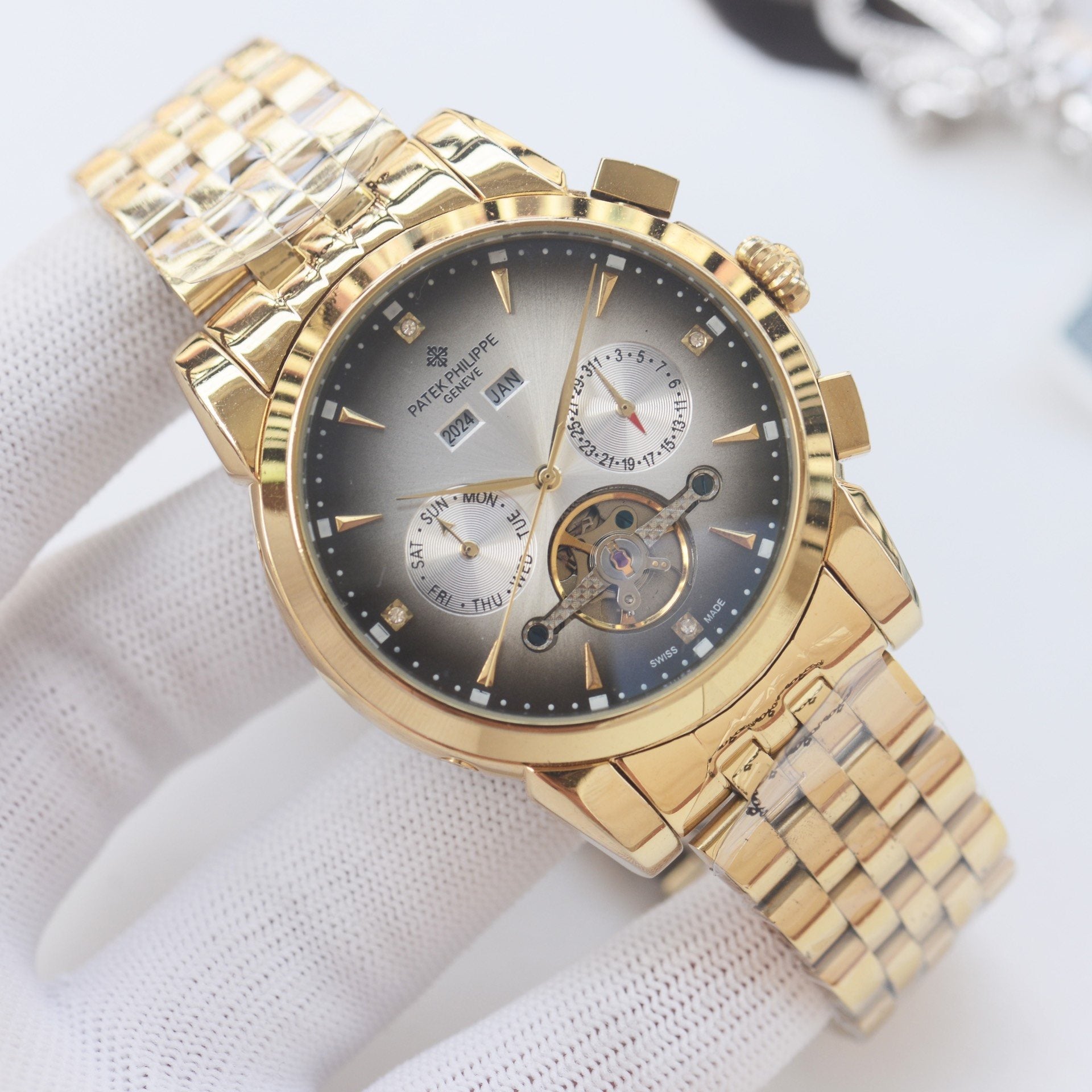 PATEK PHILIPPE Gold Bracelet Watch — hero