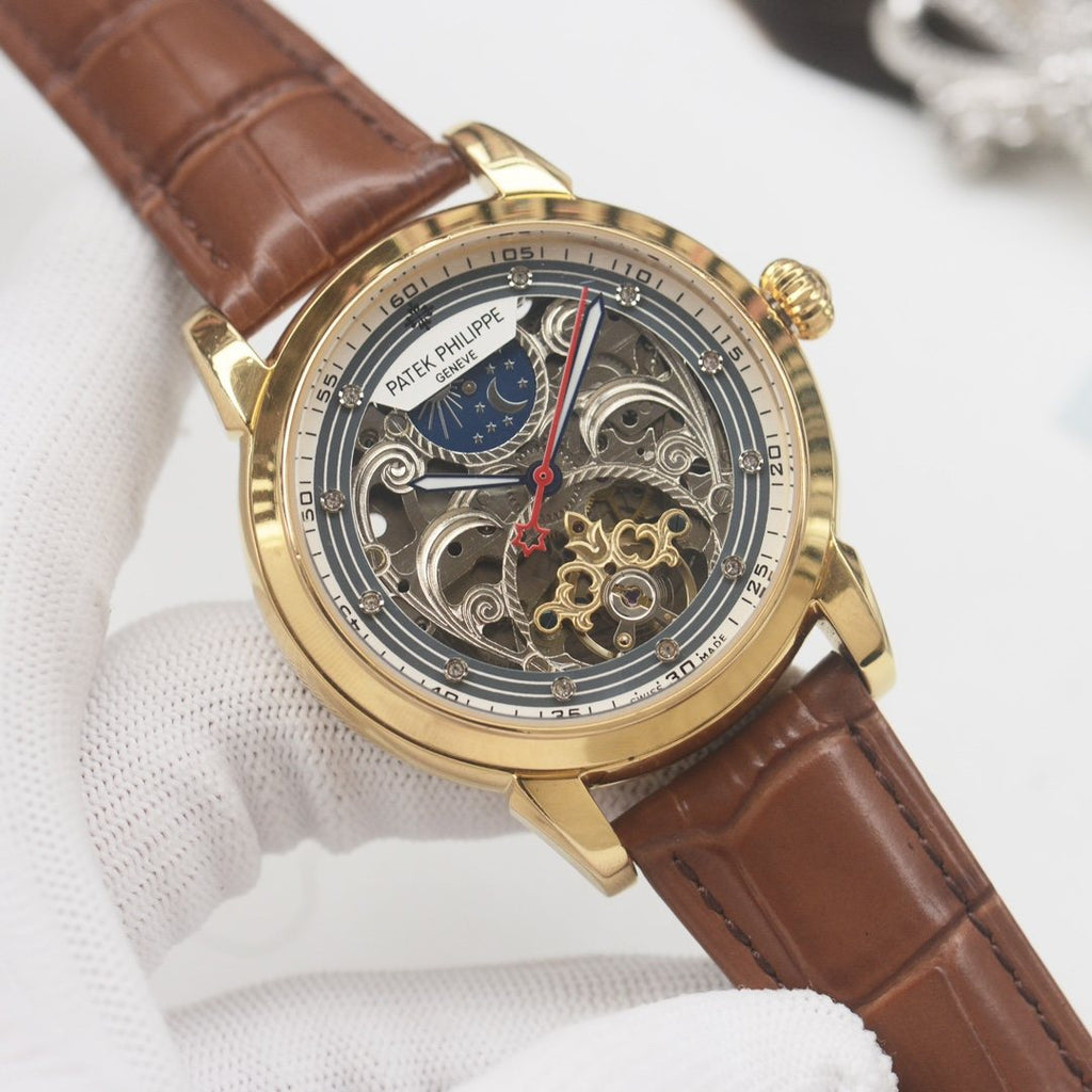 PATEK PHILIPPE Gold Brown Strap Watch — front